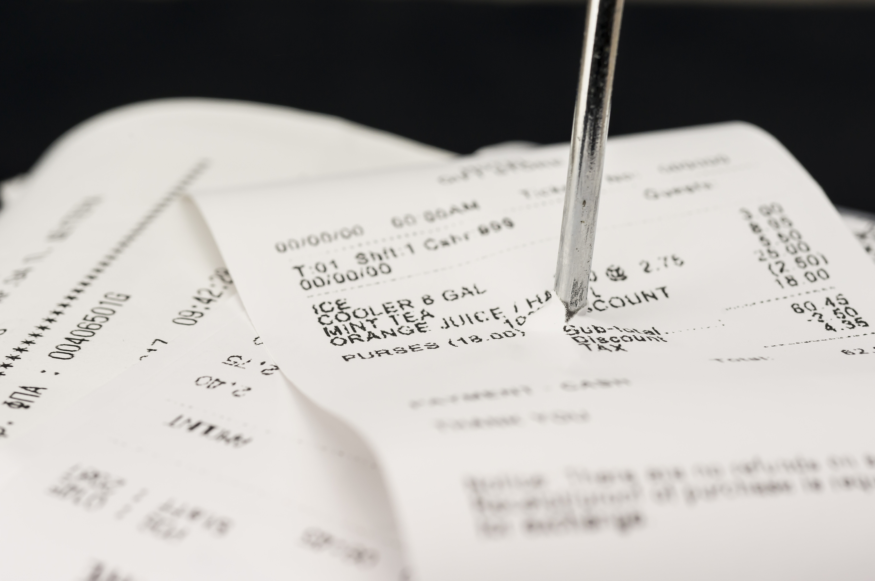 Close up shot of receipts piled up Close up shot of receipts piled up