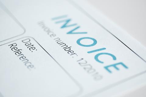 Image of a document with the word "invoice" at the top. 