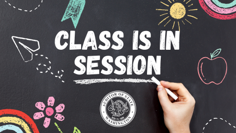 class is in session written on school chalkboard